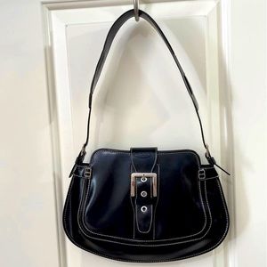 TOD’s black leather shoulder bag